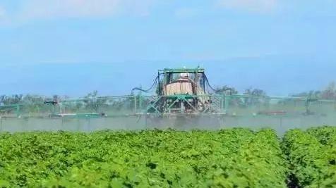 Spraying pesticides Spraying pesticides